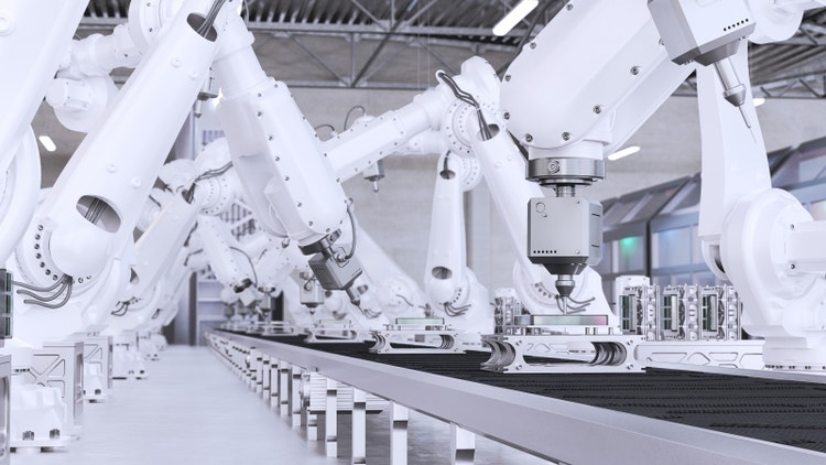 Robots aan het werk in een machine / fabriek